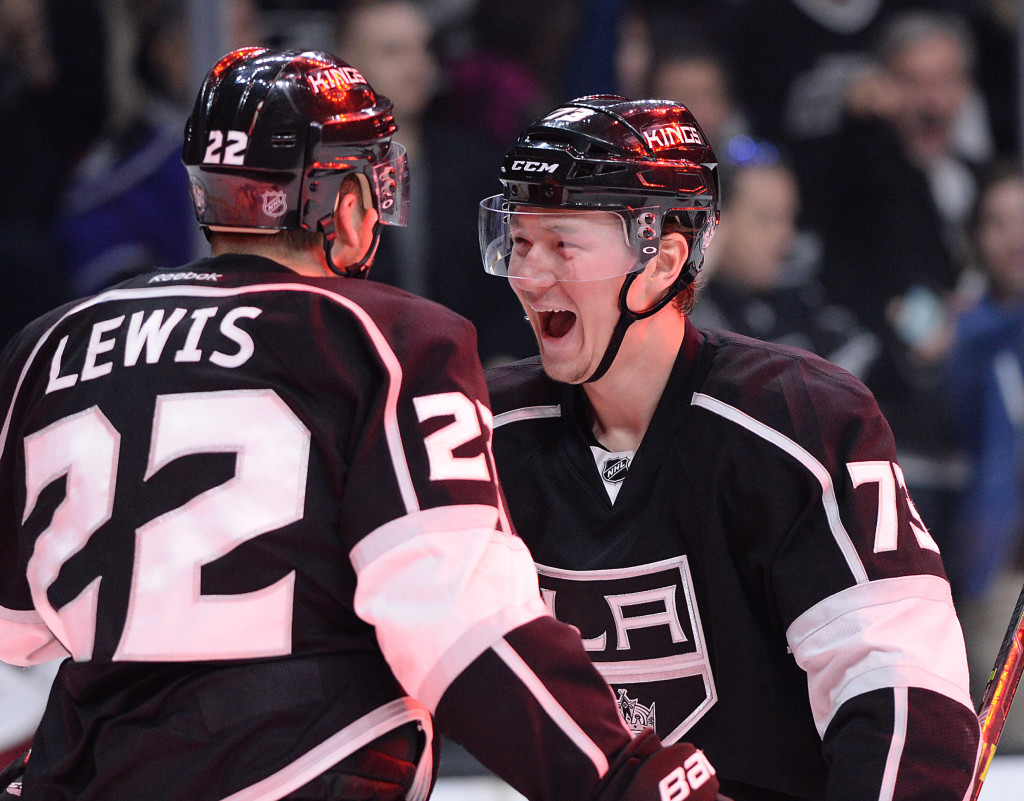 Dec 20, 2014; Los Angeles, CA, USA; Los Angeles Kings center Trevor Lewis (22) celebrates after scoring a goal with an assist by center Tyler Toffoli (73) in the third period of the game at Staples Center. Kings won 4-2. (Jayne Kamin-Oncea-USA TODAY Sports)