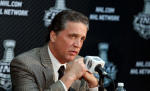 LOS ANGELES, CA - JUNE 03:  Dean Lombardi, President and General Manager of the Los Angeles Kings, speaks during Media Day for the 2014 NHL Stanley Cup Final at Staples Center on June 3, 2014 in Los Angeles, California.  (Photo by Bruce Bennett/Getty Images)