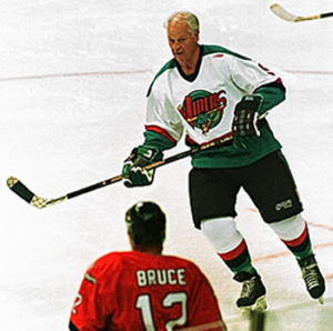 Hockey legend Gordie Howe skates with the Detroit Vipers of the International Hockey League in a game against the Kansas City Blades in Auburn Hills, Mich., on Friday, Oct. 3, 1997. Howe spent 48 seconds on the ice during the first period to become the first professional hockey player to play in six different decades. (AP Photo/Jeff Kowalsky)