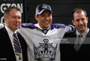 (Look at that 2nd overall draft pick looking into his future of two Stanley Cup victories, two Olympic Gold Medals and a Norris Trophy. No wonder he has a huge smile!)