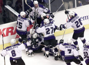 23 Apr 2001: The Los Angeles Kings celebrate their 3-2 overtime victory against the Detroit Red Wings after Adam Deadmarsh #28 scored the game-winner in Game Six of the NHL Western Conference playoff quarterfinals at Staples Center in Los Angeles, California. DIGITAL IMAGE. Mandatory Credit: Donald Miralle/ALLSPORT