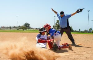 Umpire slides safe