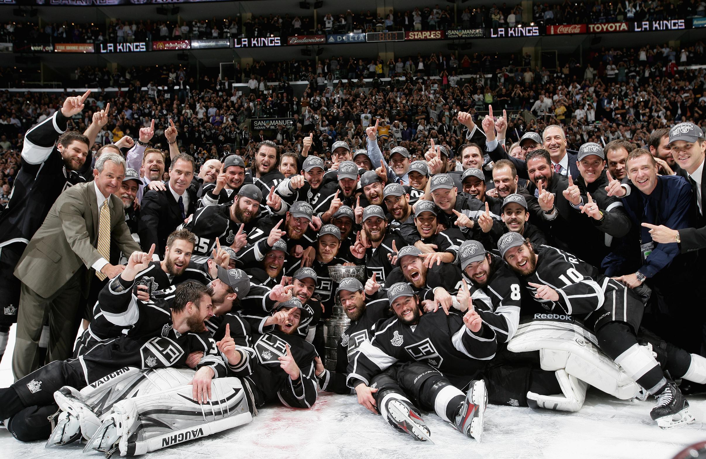 Dustin Brown with the Stanley Cup Trophy after Winning Game 6 of the 2012  Stanley Cup Finals Sports Photo