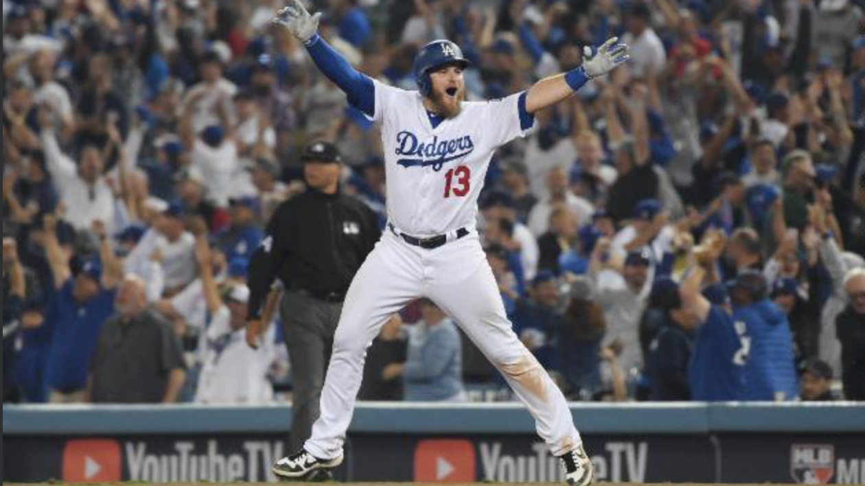 Red Sox reliever Nathan Eovaldi throws a strike to Dodgers Yasiel Puig